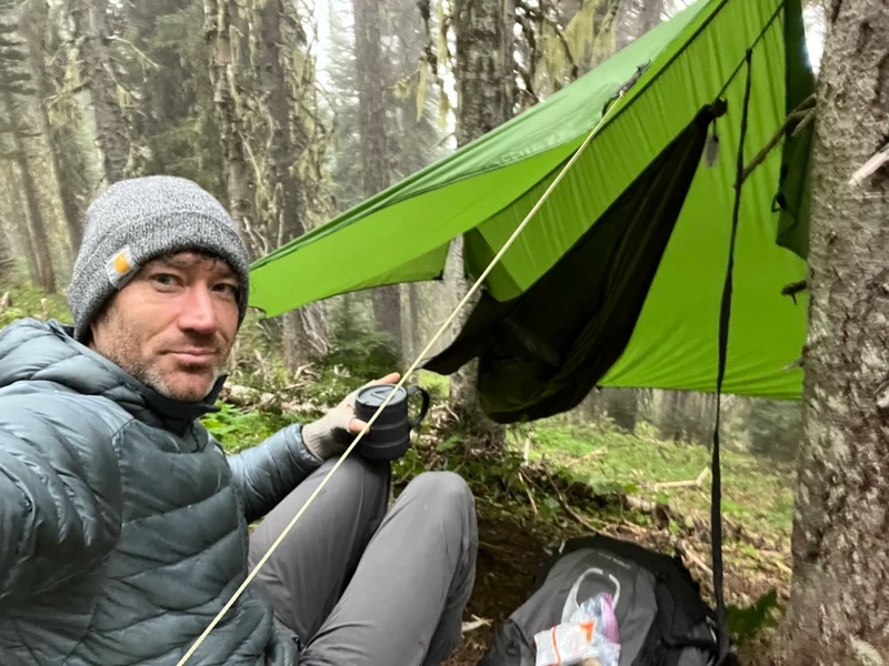 Joe camping in the wilderness